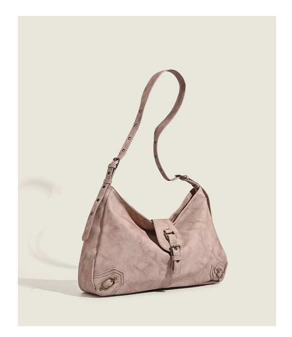 Slouchy distressed leather-look hobo bag with antique brass buckle closure and adjustable shoulder strap, detail view 11
