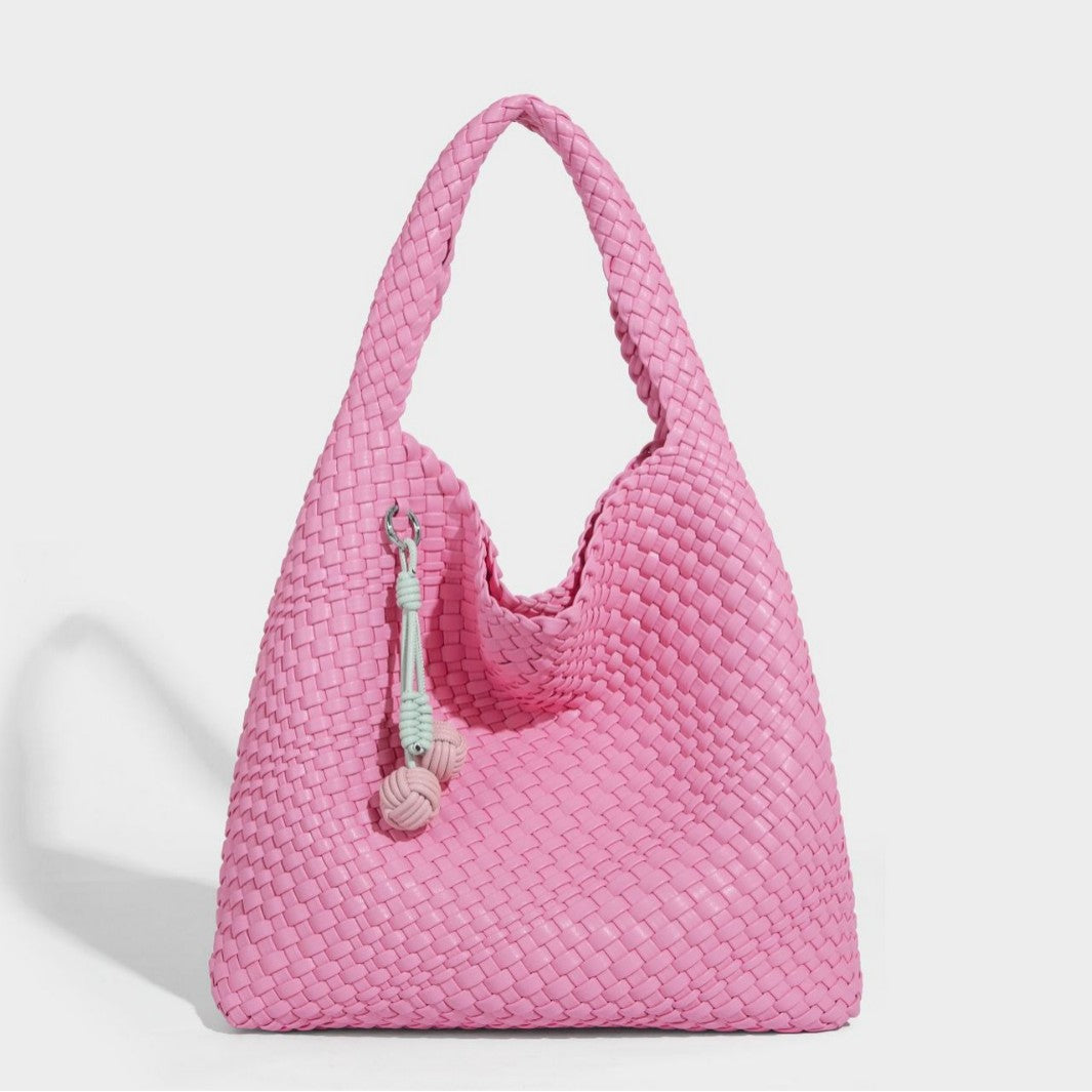 Soft hand-woven slouchy hobo tote bag with knotted tassel charm and single looped shoulder strap, detail view 4