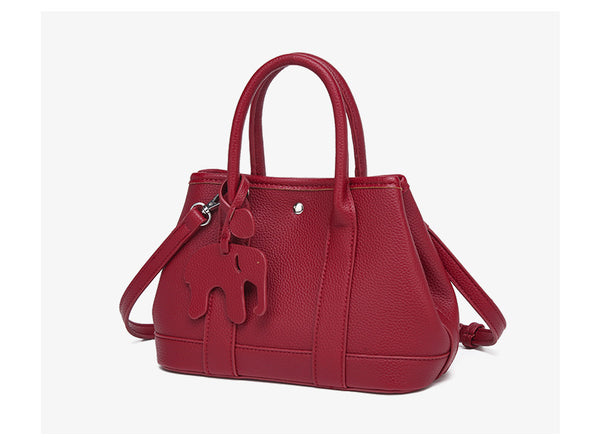 Structured pebbled leather-look top-handle tote bag with elephant charm and detachable shoulder strap, detail view 19