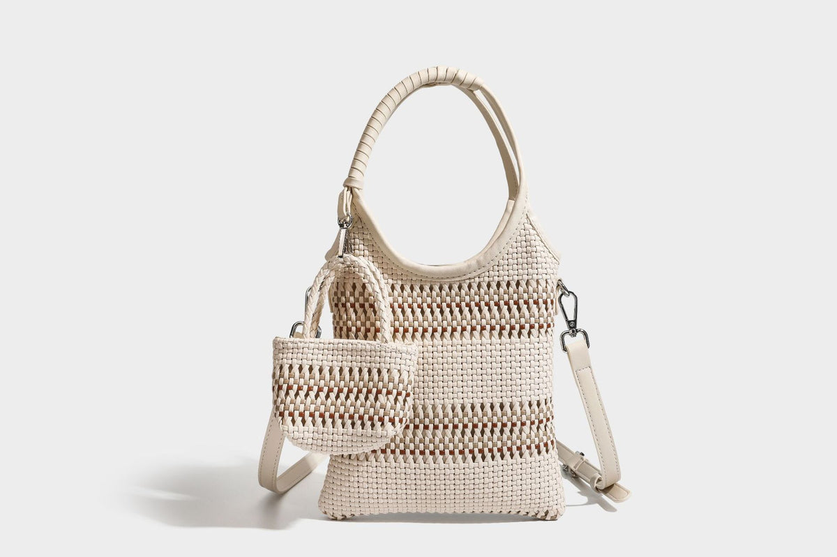 Color-block woven tote bag with rounded leather-look handles, detachable crossbody strap, and matching mini clip-on pouch in