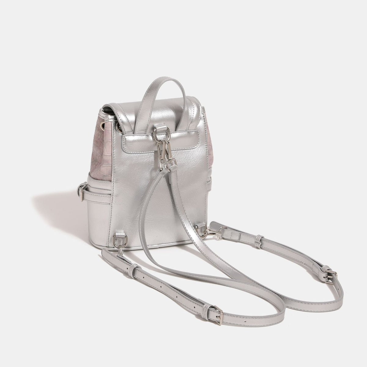 Croc-embossed mini backpack with silver metallic leather-look trim, decorative chain, and metal logo clasp, detail view 3