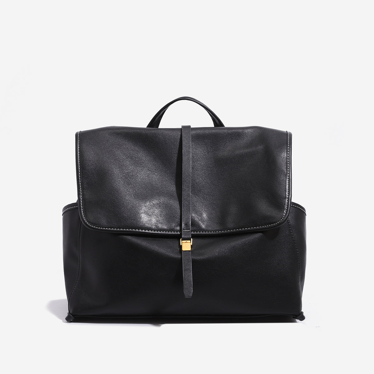 Structured retro flap backpack handbag in brown leather-look finish with gold-tone toggle clasp and top handle, detail view 6