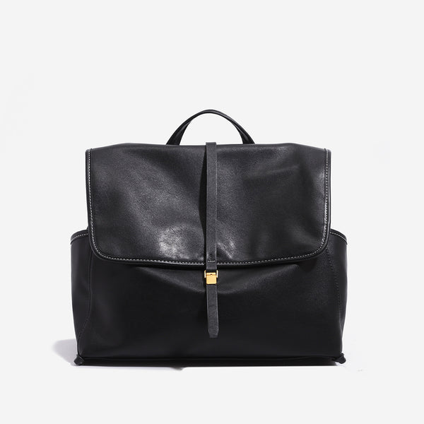 Structured retro flap backpack handbag in brown leather-look finish with gold-tone toggle clasp and top handle, detail view 6