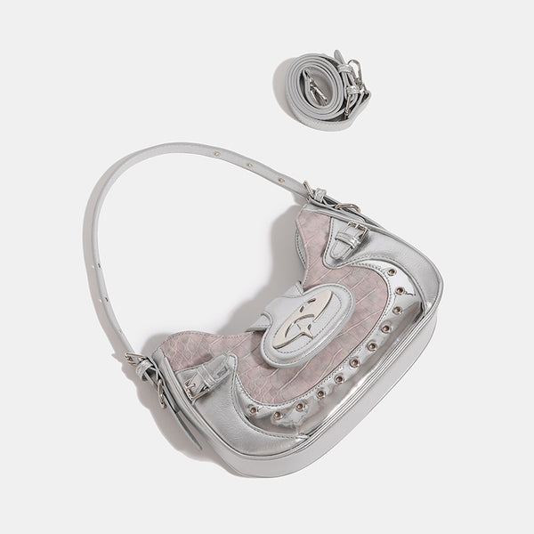 Compact croc-embossed leather-look shoulder bag with silver grommet trim, buckle strap detail, and four-point star turn-lock