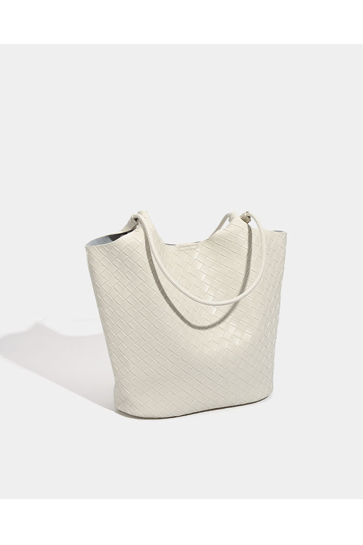 Large woven-texture open-top tote bag with single shoulder strap in butter yellow, detail view 9