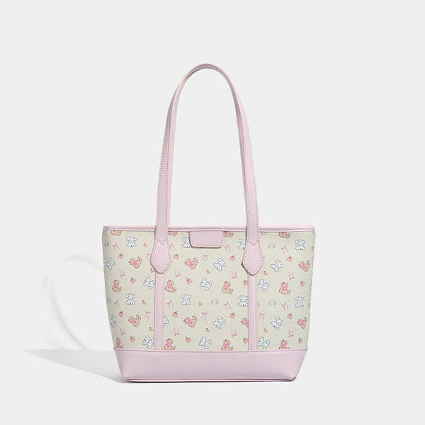 Große, strukturierte Tote-Bag mit Reißverschluss oben, Einsätzen mit pastellfarbenem Cartoon-Print, glattem Besatz in rosafarbener Lederoptik und zwei Schulterriemen