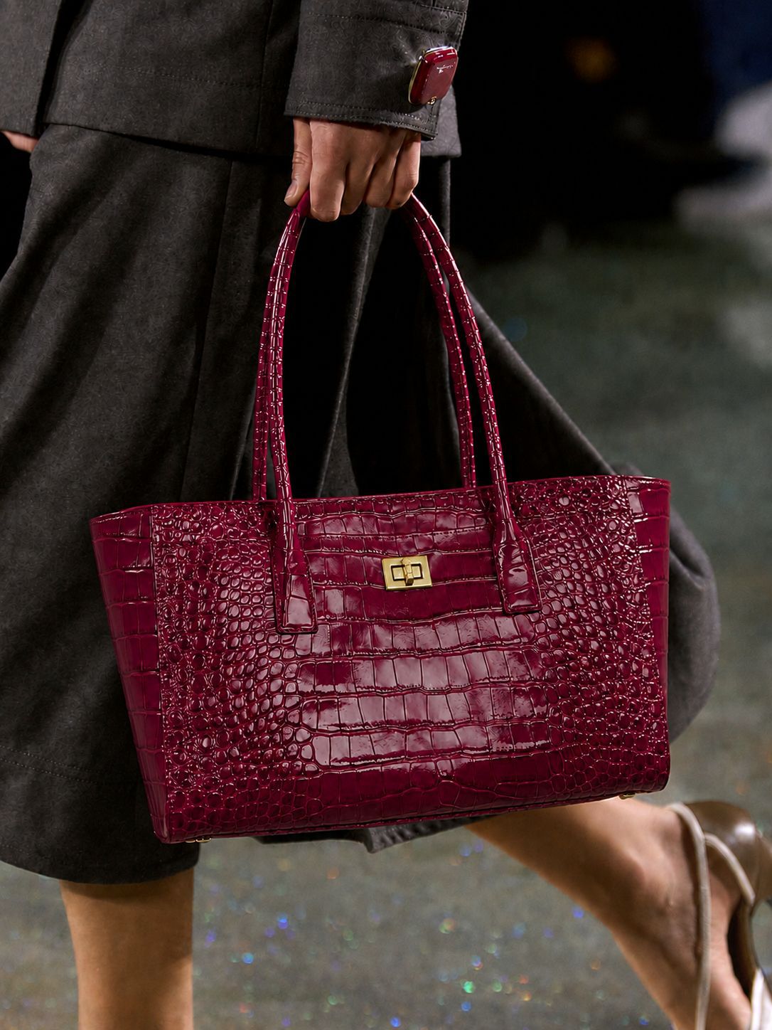 Structured glossy crocodile-embossed tote bag with gold-tone turn-lock closure and double top handles, detail view 11