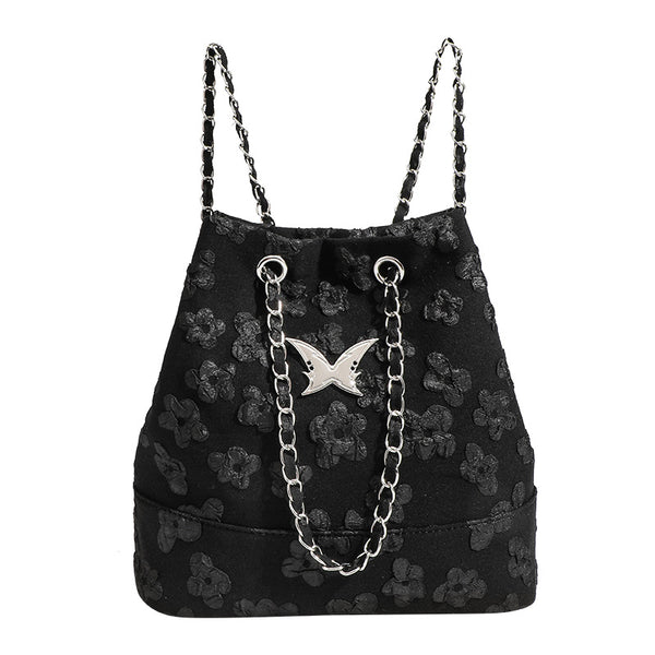 Beuteltasche aus floralem Jacquard mit Kettenriemen in Silberoptik und Schwalben-Medaillonbeschlag, Detailansicht 5