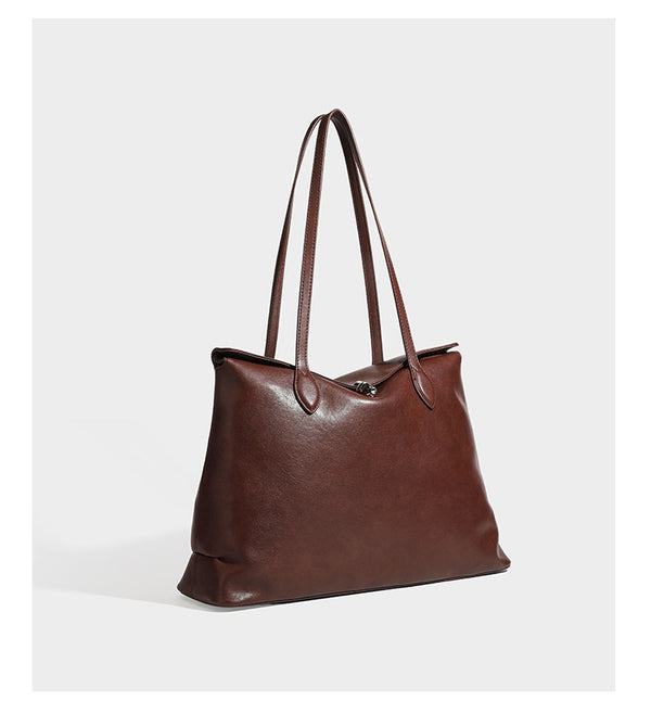 Large leather-look tote shoulder bag with slim double straps and silver-tone turn-lock closure, detail view 8