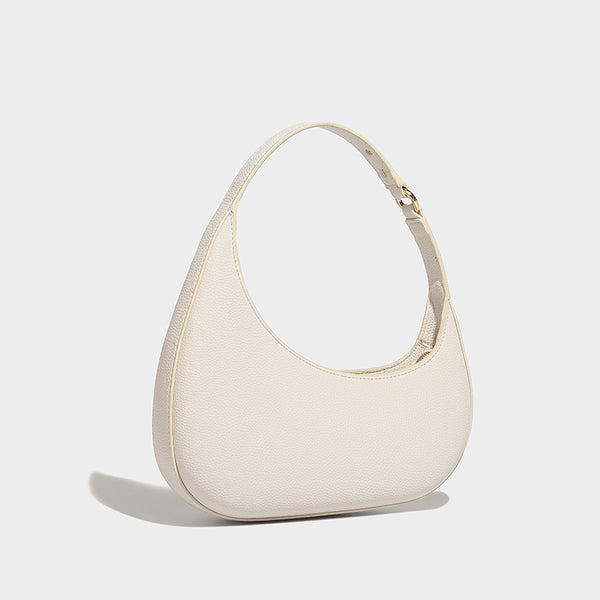 Halbmond-Schultertasche mit genarbter Oberfläche, einem Schlaufenhenkel und goldfarbenen Reißverschlussbeschlägen, Detailansicht 2