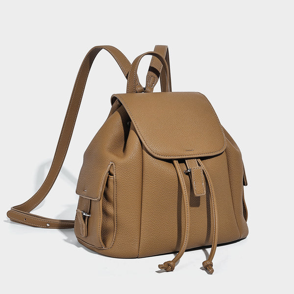 Compact pebbled leather-look flap drawstring backpack handbag with side pockets, top handle, and silver-tone hardware, detail