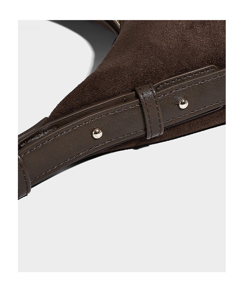 Dark brown suede-look hobo shoulder bag with top zip closure, adjustable strap, and small detachable mini pouch, detail view