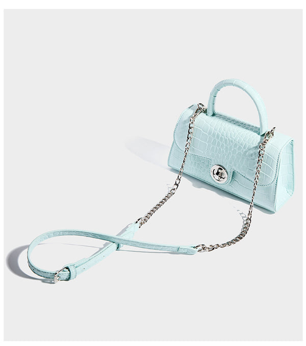 Mini croc-embossed glossy structured handbag with silver-tone turn-lock clasp and short top handle, detail view 11