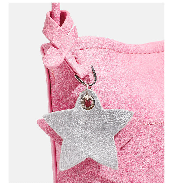 Small vertical textured mini crossbody phone bag with long braided cord strap and silver-toned star charm, detail view 19