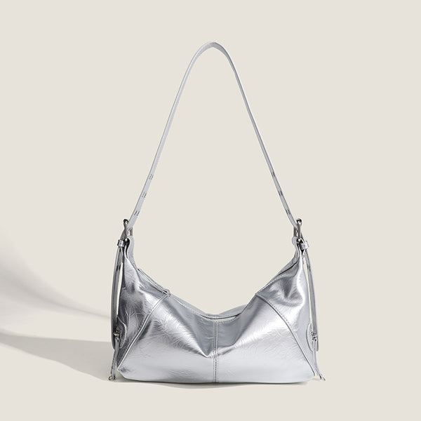 Glossy crinkled mini hobo shoulder bag with studded adjustable strap and silver-tone hardware, detail view 7