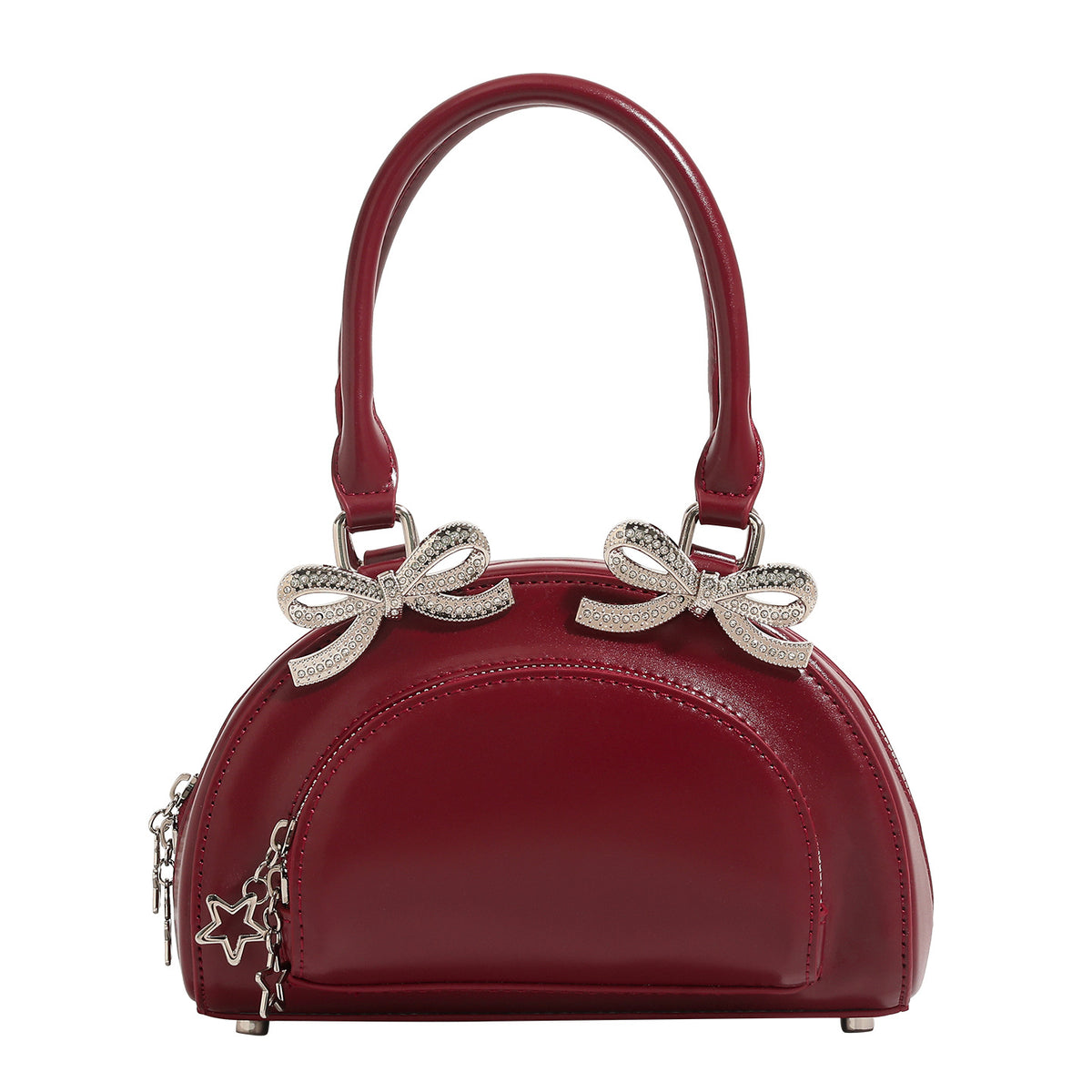 Structured half-moon mini handbag with silver-tone crystal bow hardware and star charm chain, detail view 5