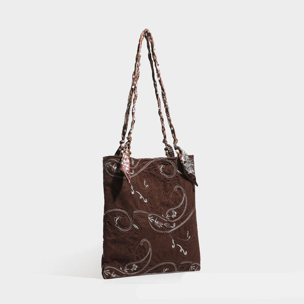 Brown suede-finish tote bag with paisley embroidery and braided fabric-ribbon shoulder strap, detail view 4