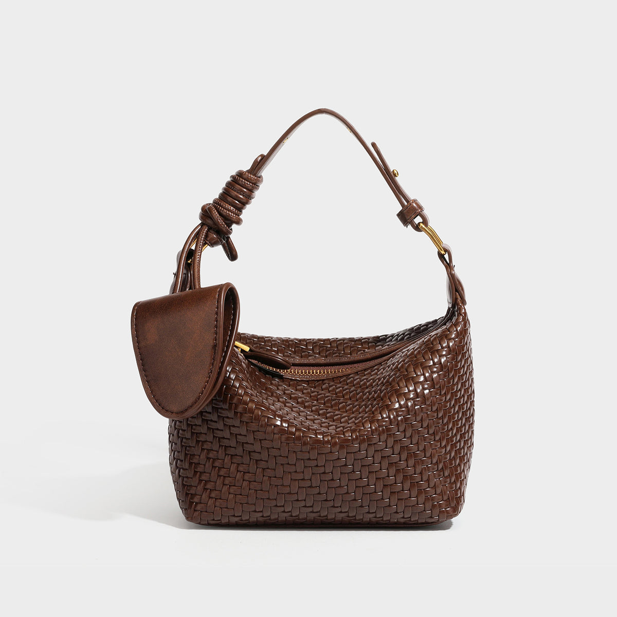 Small glossy basket-weave hobo shoulder bag in brown with knotted top handle, flap accent pocket, and gold-tone hardware