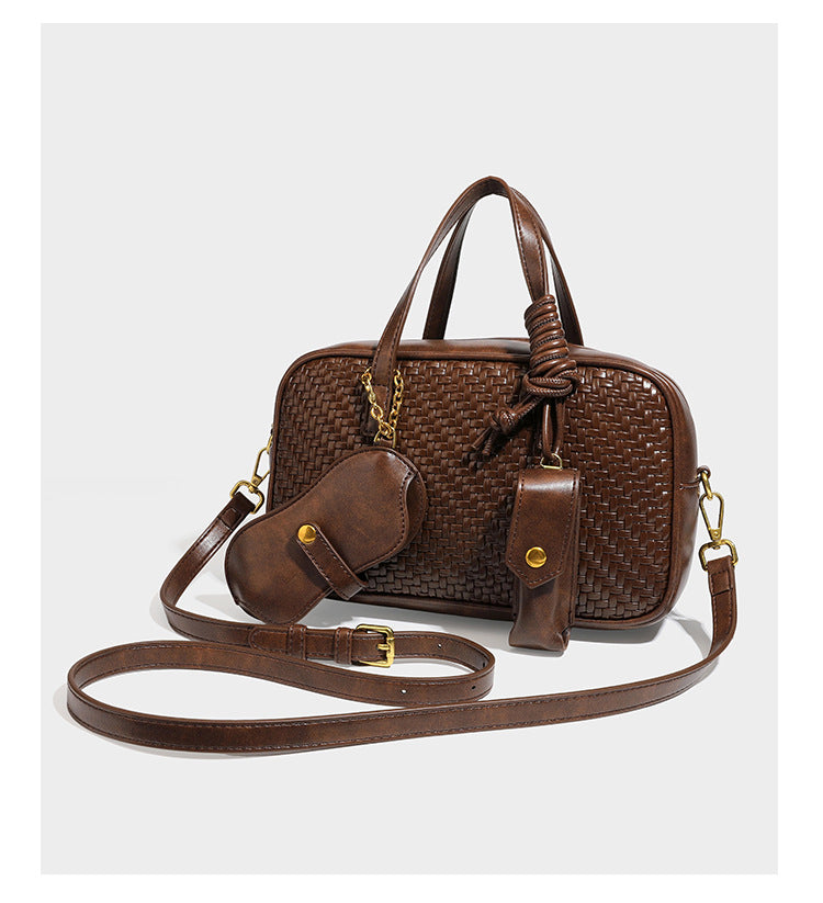 Strukturierte rechteckige Satchel-Tasche mit gewebtem Vorderteil in Lederoptik, goldfarbenen Details, zwei Tragegriffen und abnehmbarem
