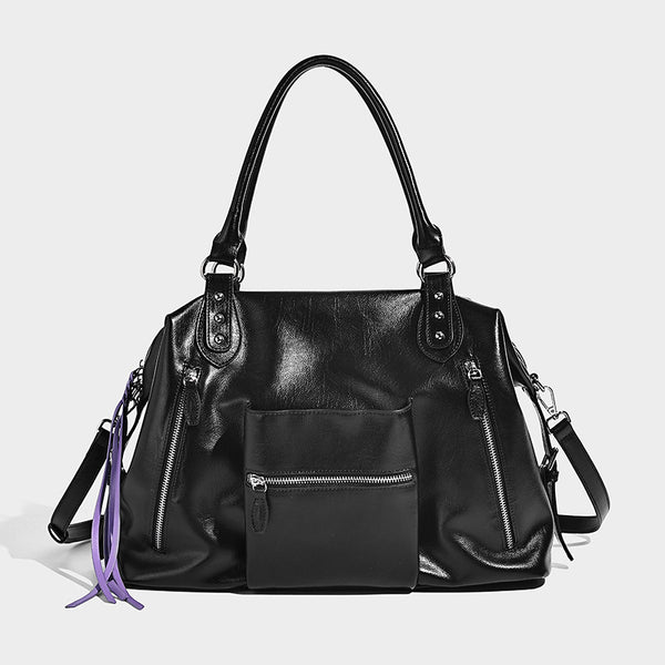 Glänzende strukturierte Henkeltasche im Tote-Stil mit zwei Tragegriffen, abnehmbarem Umhängeriemen, Reißverschlusstaschen auf der Vorderseite und Beschlägen in Silberoptik