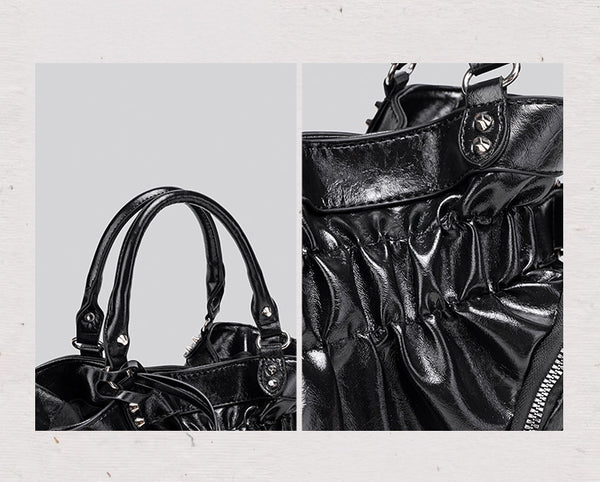 Black glossy ruched convertible tote bag with silver-tone rivets, detachable wide shoulder strap, external zip pouch, and