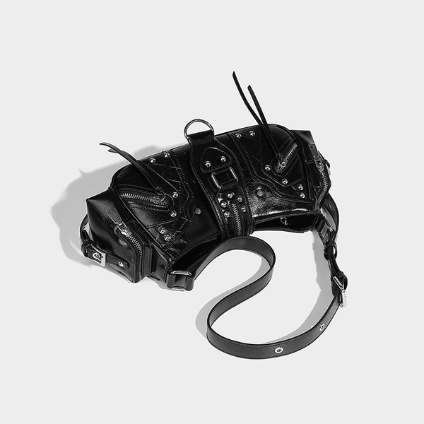Compact glossy leather-look crossbody bag with silver studs, buckle hardware, and multiple zip pockets, detail view 25