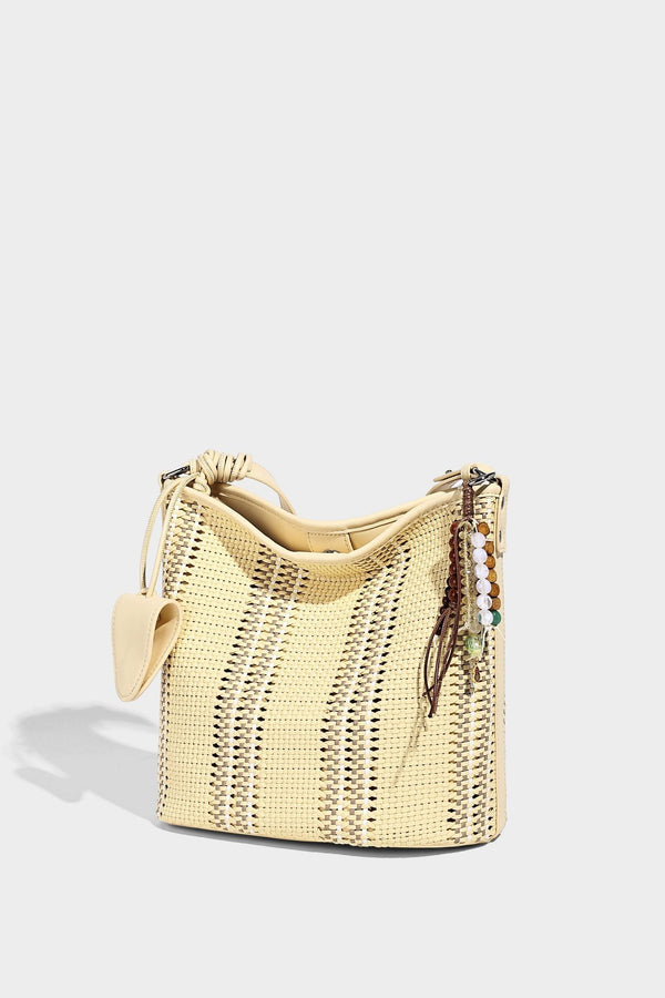 Woven bucket shoulder bag with leather-look trim, silver-tone hardware, and beaded tassel charm, detail view 26