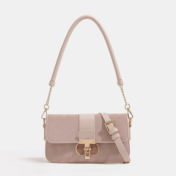 Compact quilted flap crossbody bag with gold turn-lock clasp and adjustable shoulder strap, detail view 7