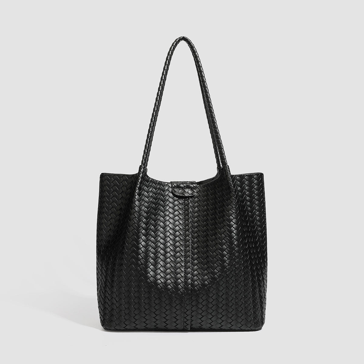 Large black basket-weave leather-look tote bag with long braided shoulder straps and matching woven zip pouch, detail view 6