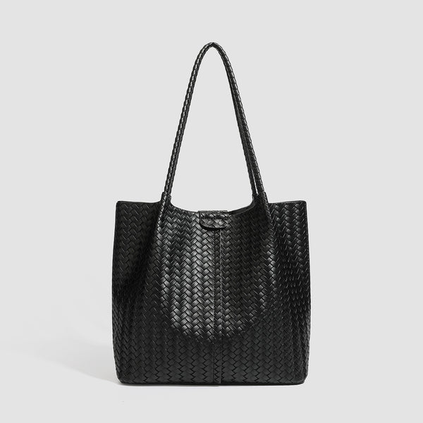 Large black basket-weave leather-look tote bag with long braided shoulder straps and matching woven zip pouch, detail view 6