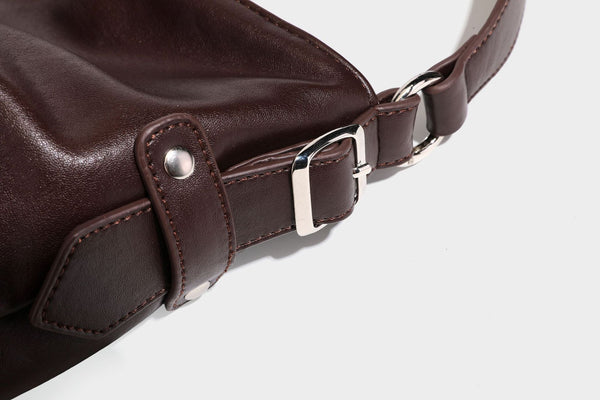Large slouchy hobo shoulder bag in dark brown with smooth leather-look finish, adjustable strap, and silver-tone hardware