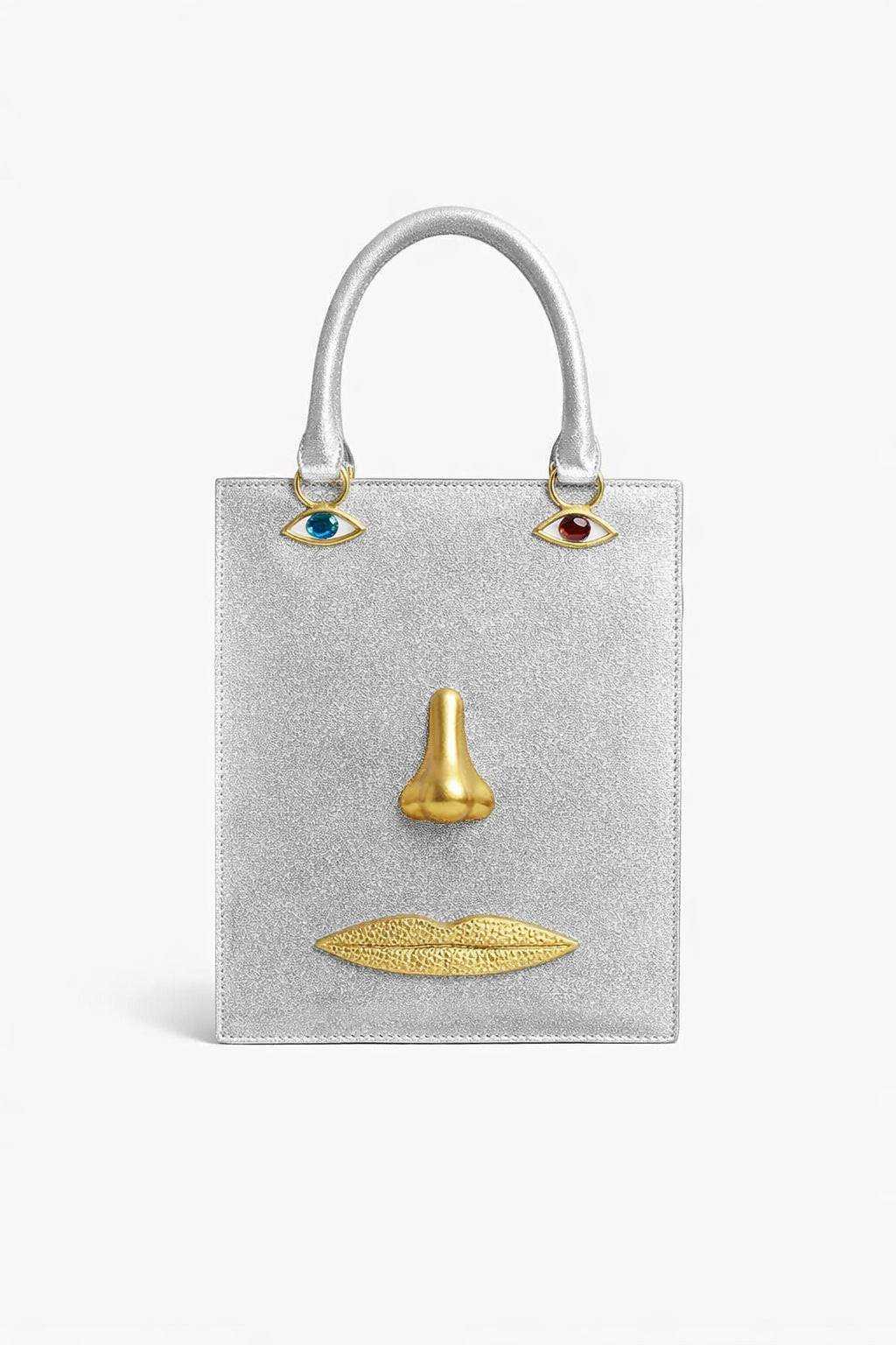 Structured rectangular top-handle bag in tan leather-look finish with gold-tone sculptural face hardware including