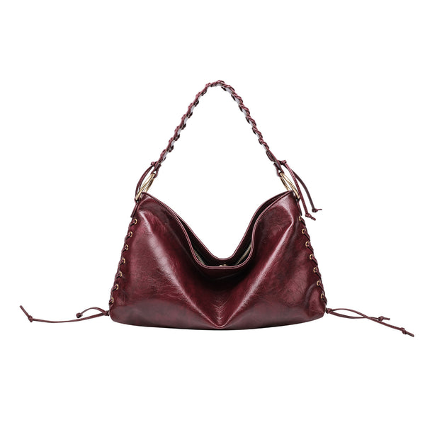 Large slouchy hobo shoulder bag with braided top handle, gold-tone O-ring hardware, and lace-up side cord detailing in