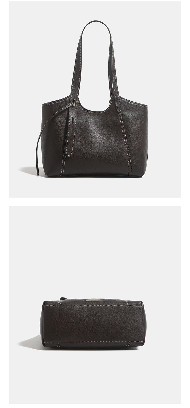 Structured leather-look tote shoulder bag with double crossed straps, contrast topstitching, and metal bar hardware, detail