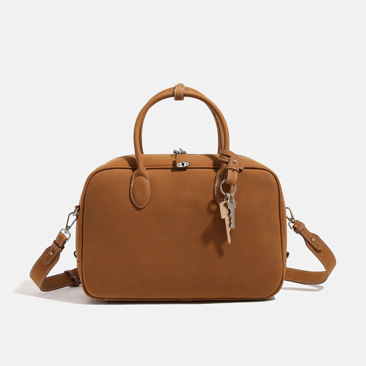Strukturierte, rechteckige Henkeltasche mit matter, genarbter Oberfläche, zwei gerollten Henkeln, silberfarbenen Reißverschlussbeschlägen und