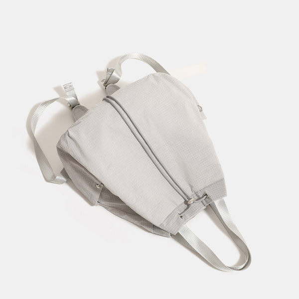 Large glacier gray grid-texture nylon drawstring backpack tote with dual top handles and adjustable backpack straps, detail