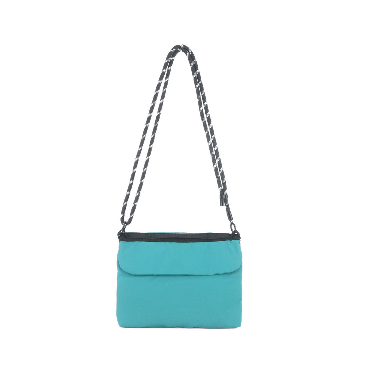 Flat rectangular crossbody bag with mesh front pocket, top zip closure, and adjustable patterned strap, detail view 5