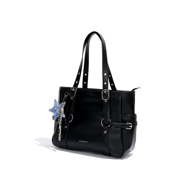 Large structured black leather-look tote bag with zip top, silver-tone hardware, side buckle straps, and detachable denim