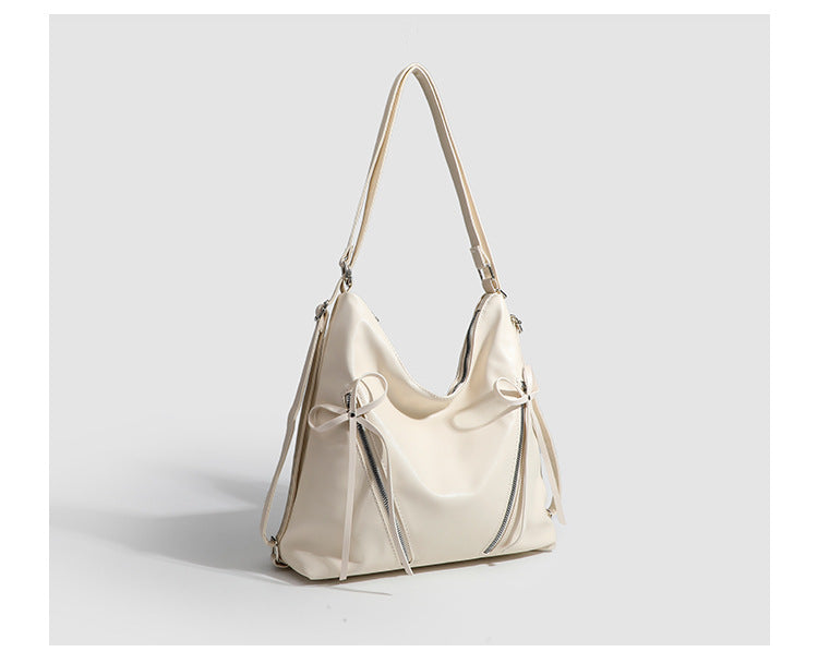 Slouchy hobo shoulder bag with bow detail and silver-tone hardware, detail view 20
