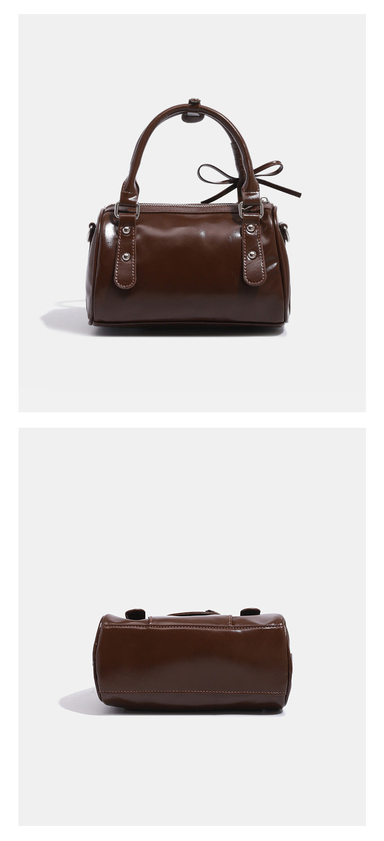 Kleine, formstabile Glanzledertasche mit zwei Henkeln, vorderer Klappentasche, herzförmigem Charm-Verschluss und silberfarbenem