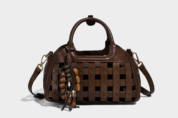 Small structured woven lattice top-handle satchel bag with bead-and-tassel charm and gold-tone hardware, detail view 13
