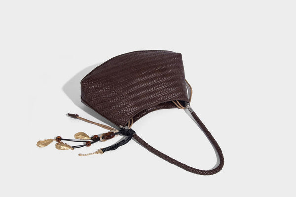 Woven leather-look hobo shoulder bag with braided strap and silver-tone hardware, detail view 24