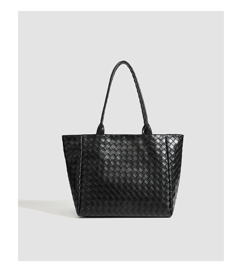 Large structured black woven diamond-pattern tote bag with braided double shoulder straps and glossy leather-look finish