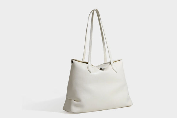 Large leather-look tote shoulder bag with slim double straps and silver-tone turn-lock closure, detail view 24