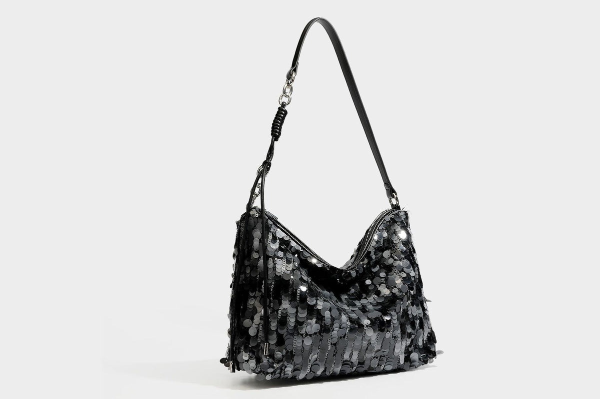 Slouchy paillette sequin hobo shoulder bag with zip closure and adjustable leather-look strap with silver chain hardware