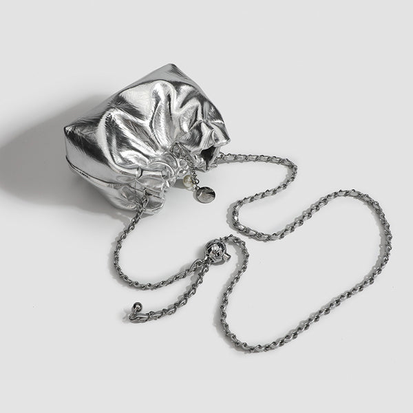 Small ruched drawstring bucket bag with twisted-link chain strap and pearl charm pull, detail view 3