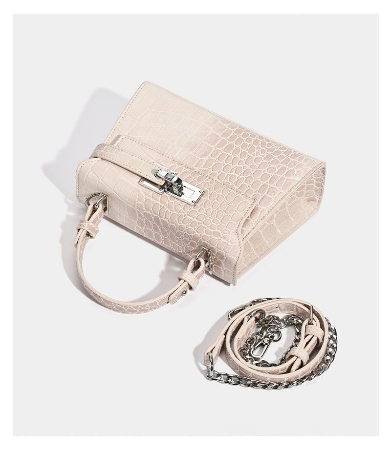 Croc-embossed mini top-handle satchel with silver turn-lock closure and adjustable crossbody strap, detail view 13
