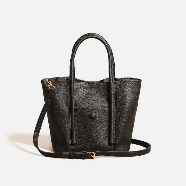 Structured pebbled matte tote bag with front snap pocket, dual top handles, and detachable zip pouch in almond beige, detail