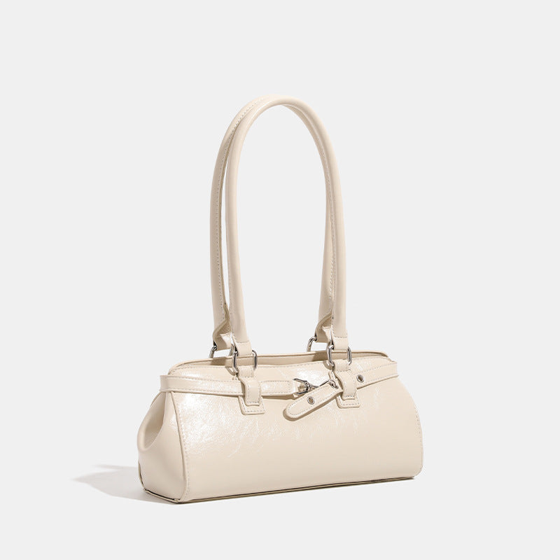 Glossy leather-look baguette shoulder bag with silver-tone hardware and buckle-strap detail, detail view 3