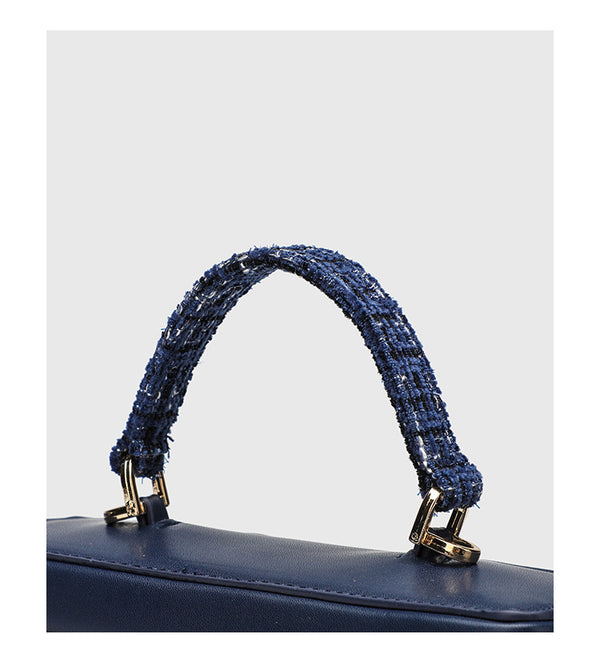 Structured navy tweed and leather-look box mini handbag with gold-tone zipper, braided top handle, and dual detachable